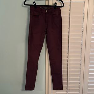 Burgundy skinny jeggings American Eagle